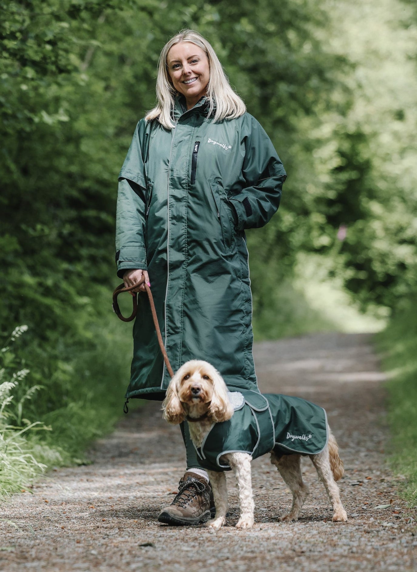 Drywalks Waterproof Dog Coat in black forest green woman matching with dog on walk