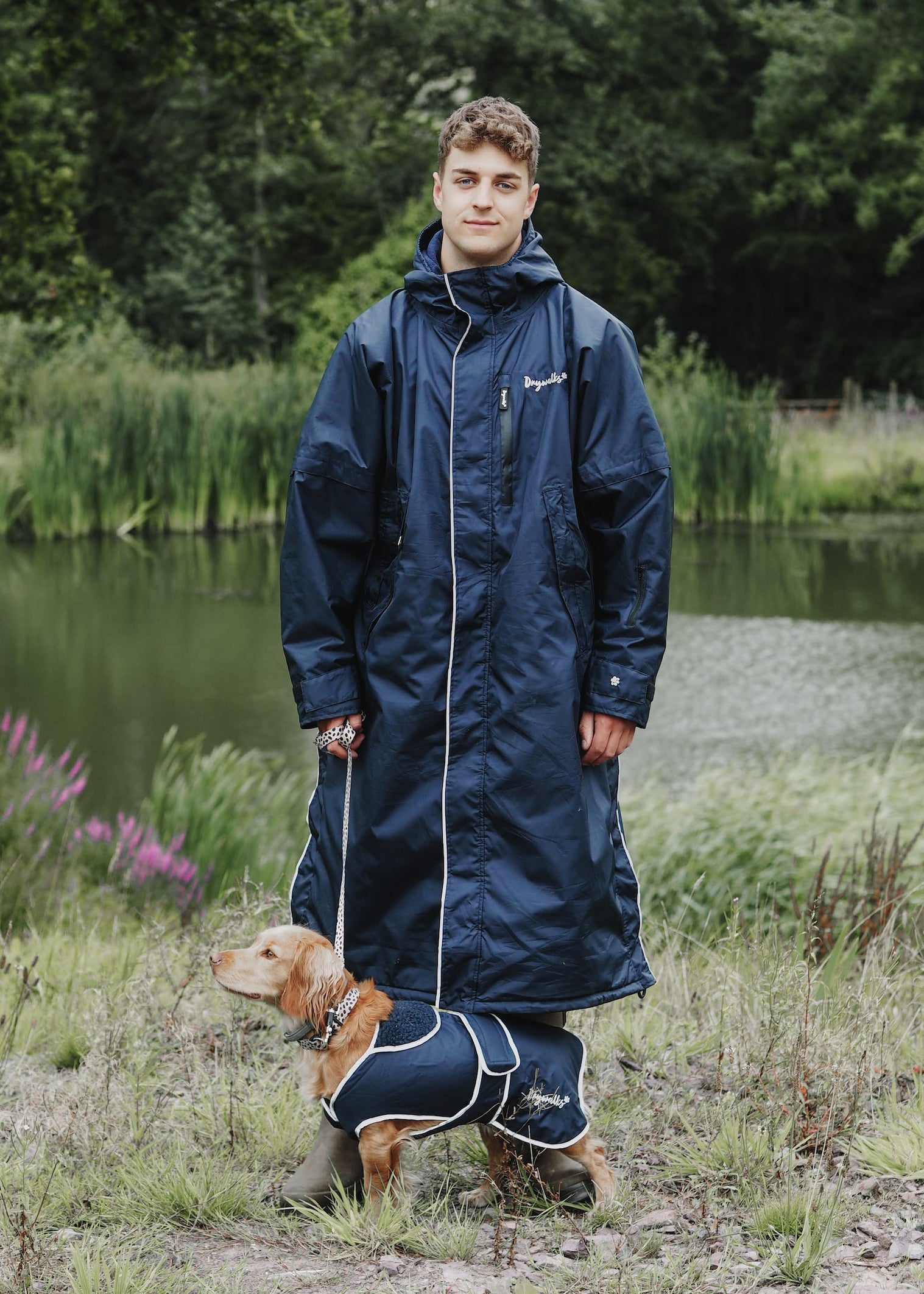 Drywalks Waterproof Dog Coat in navy man in matching coat walking dog