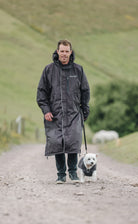 Drywalks Waterproof Dog Coat in rich brown man walking dog in matching coat