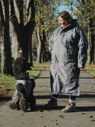 Drywalks Winter Walker Waterproof Dog Walking Coat in charcoal woman on walk with dog