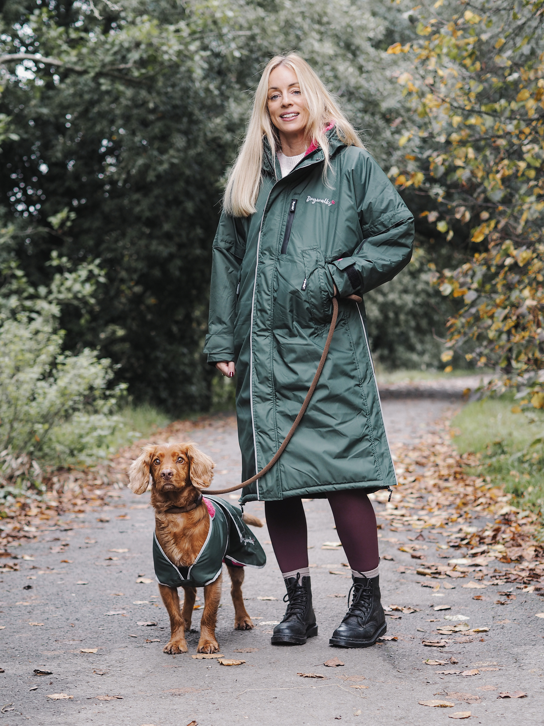 Drywalks Winter Walker Waterproof Dog Walking Coat in black forest green/pink woman on walk with dog 