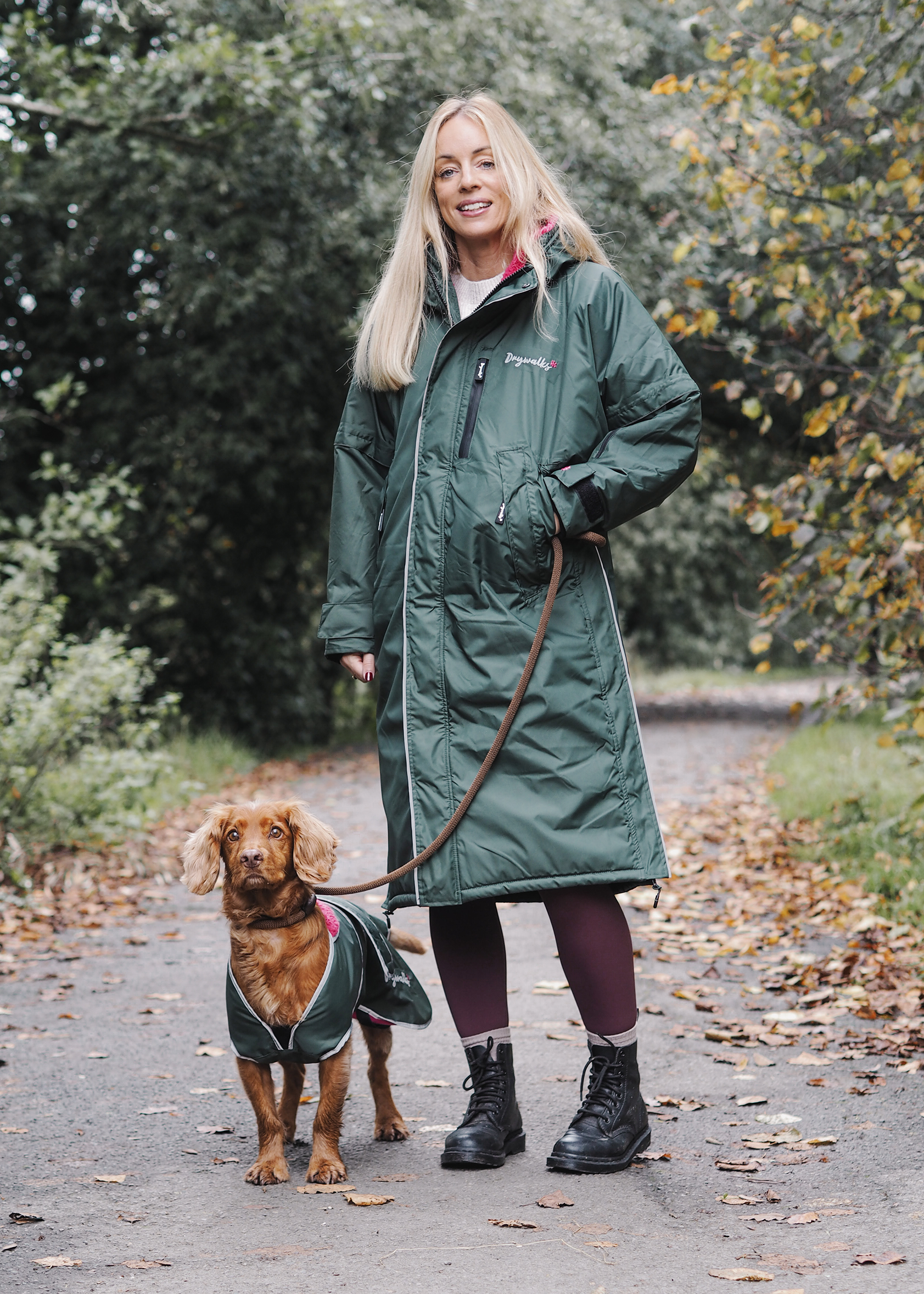 Drywalks Winter Walker Waterproof Dog Walking Coat in black forest green/pink woman on walk with dog 