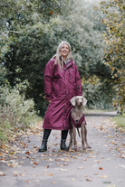 Drywalks Winter Walker Waterproof Dog Walking Coat in plum woman and dog on walk in matching coats